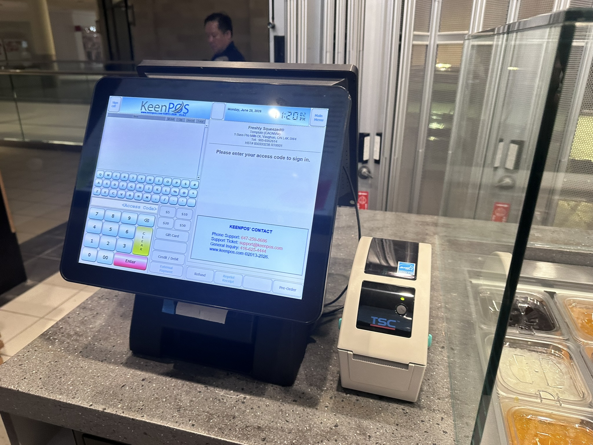 KeenPOS sign-in screen with support contacts